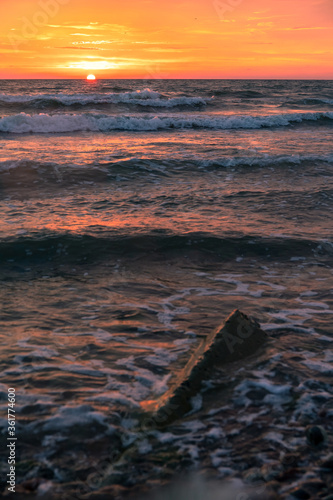 bright picturesque sunset by the sea