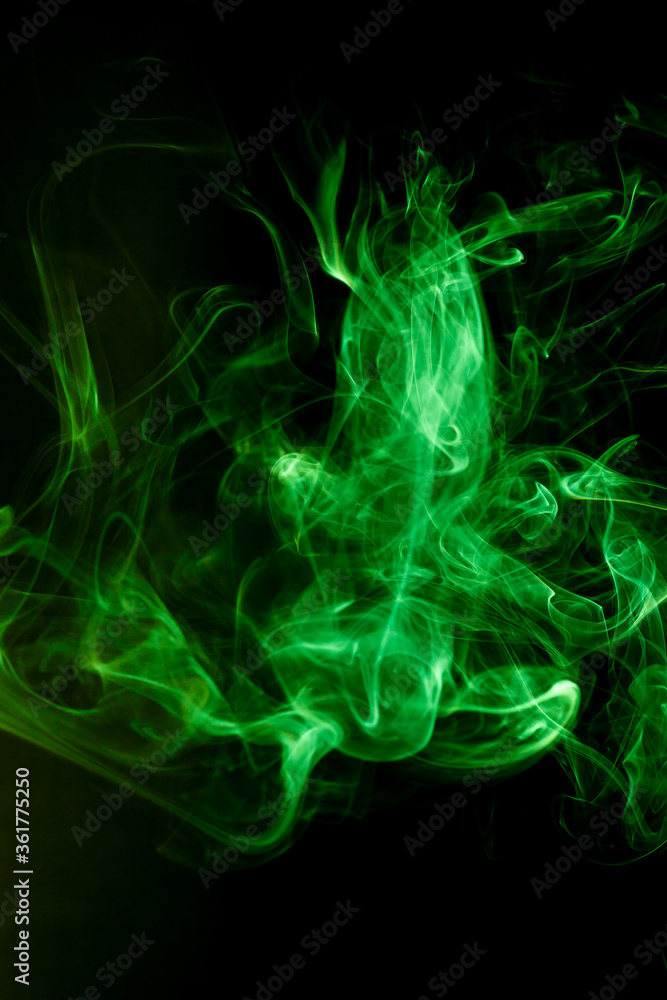 Green smoke motion on black background. Green smoke motion on black background.