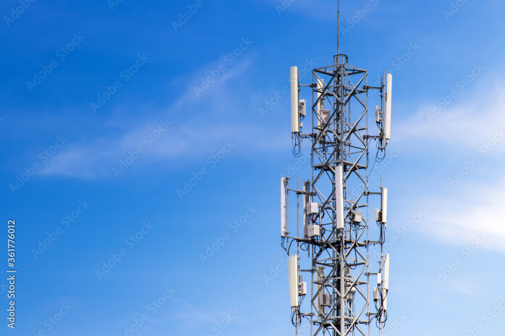 Telecommunication tower with blue sky and white clouds background,satellite pole communication technology. Telecommunication tower with blue sky and white clouds background,satellite pole communication technology.