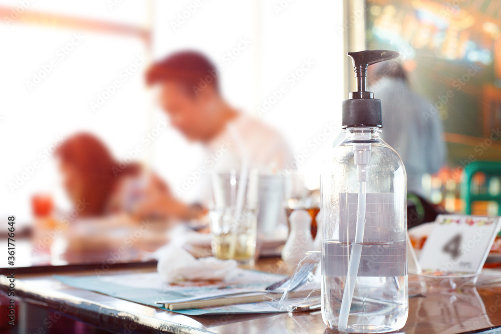 New Normal Restaurant table has Sanitizer Gel wash hand before eating
