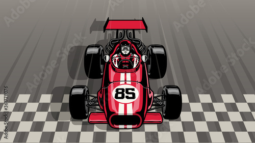 old vintage formula car driving fast passing the finish line