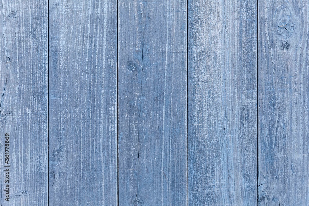 Naklejka premium Vintage style wooden fence painted blue sea texture and seamless background