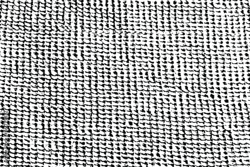 Grunge texture of coarse crumpled fabric. Monochrome background of the uneven surface of the waffle towel with halftone, noise, spots and grain. Overlay template. Vector illustration