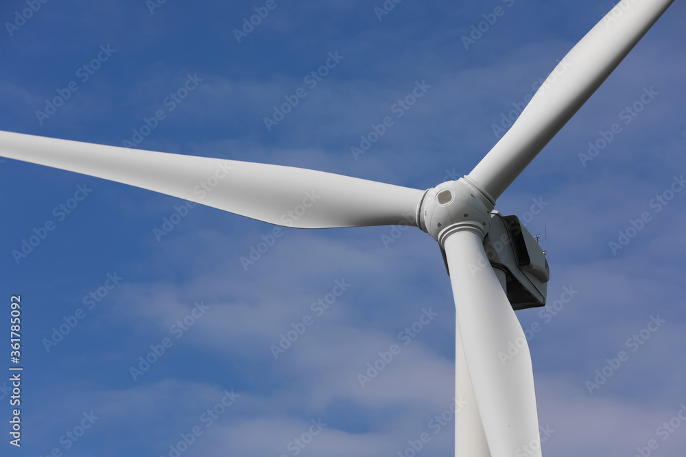 Wind turbine against beautiful sky, closeup. Alternative energy source Wind turbine against beautiful sky, closeup. Alternative energy source