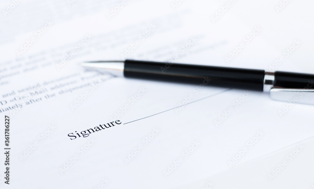 pen on a sheet of paper close-up on a white background. Contracts, business pen on a sheet of paper close-up on a white background. Contracts, business