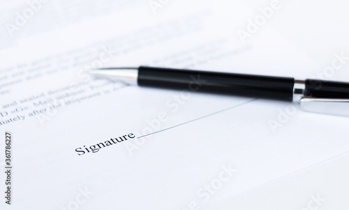 Wallpaper Mural pen on a sheet of paper close-up on a white background. Contracts, business Torontodigital.ca