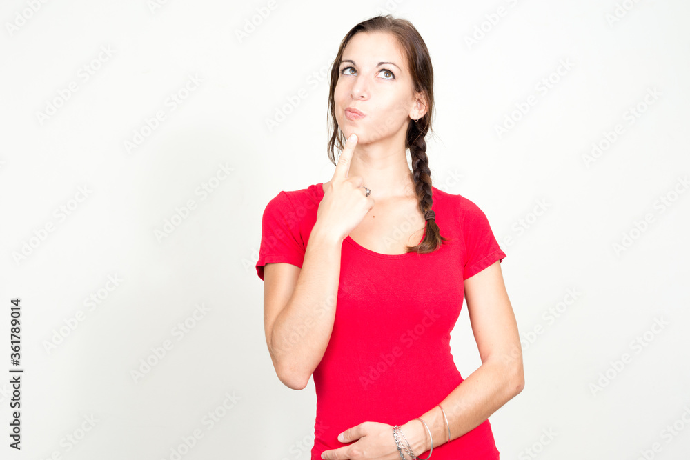 Portrait of young beautiful woman with brown hair thinking Portrait of young beautiful woman with brown hair thinking
