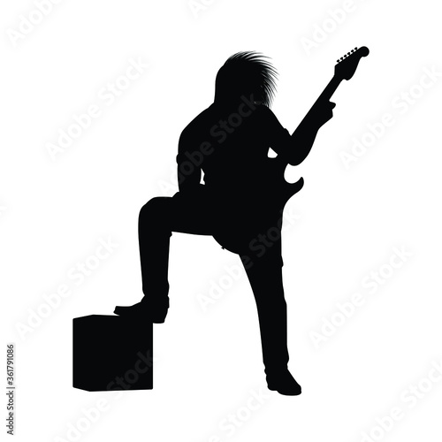 Rock musician with electric guitar silhouette vector
