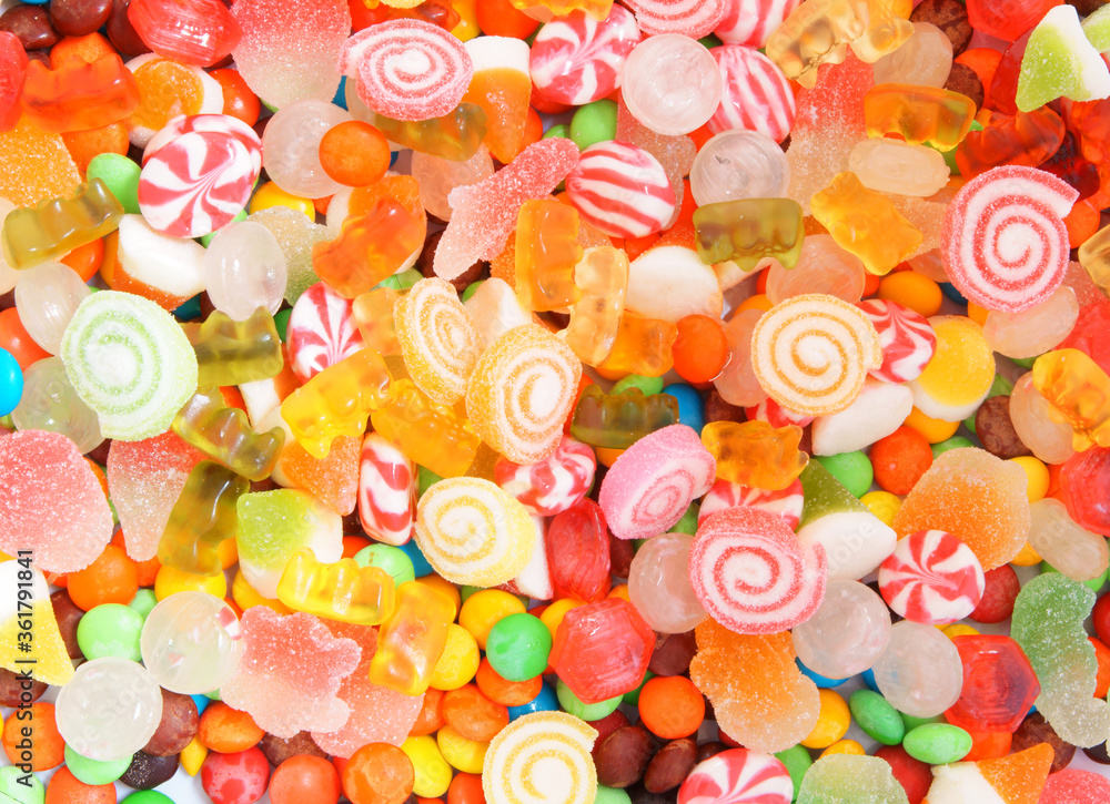 Fototapeta premium Colorful fruit candies and jellies background
