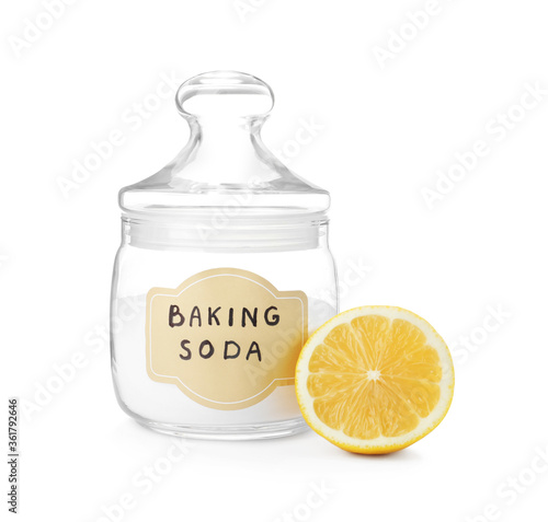 Baking soda and lemon on white background