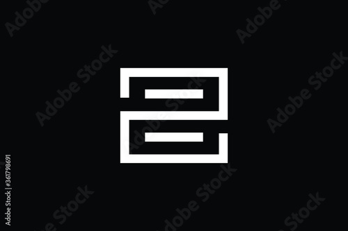 Minimal elegant monogram art logo. Outstanding professional trendy awesome artistic Z ZE EZ initial based Alphabet icon logo. Premium Business logo White color on black background