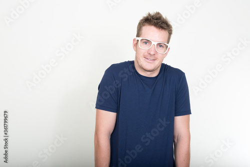 Portrait of happy handsome man with eyeglasses smiling © Ranta Images