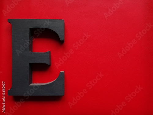 red background with letter e
