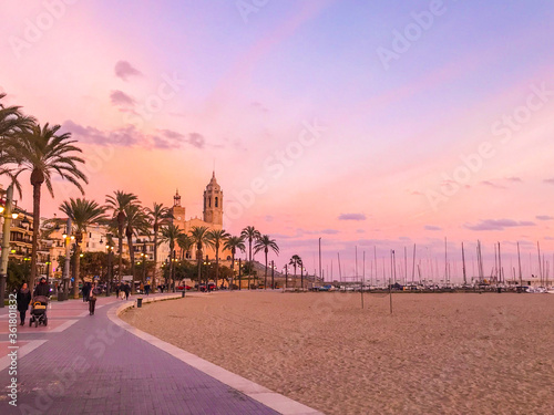 Tarde colorida en la playa de Sitges, Barcelona photo