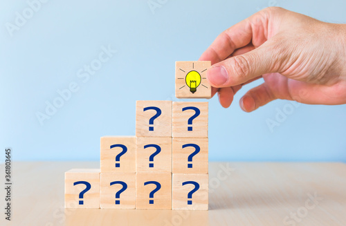 Cubes dice with light bulb and question mark