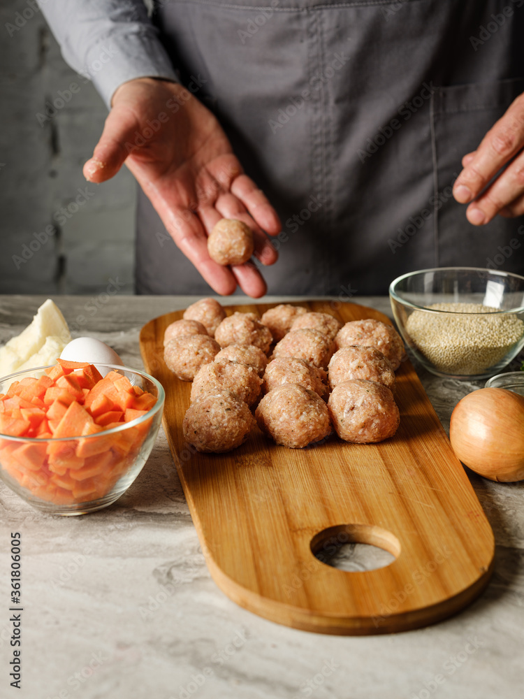 Cutlet meatball with farm minced meat cooking by chef hands with vegetables, herbs, spices and other ingredients by family recipe on home kitchen background with ingredients Cutlet meatball with farm minced meat cooking by chef hands with vegetables, herbs, spices and other ingredients by family recipe on home kitchen background with ingredients