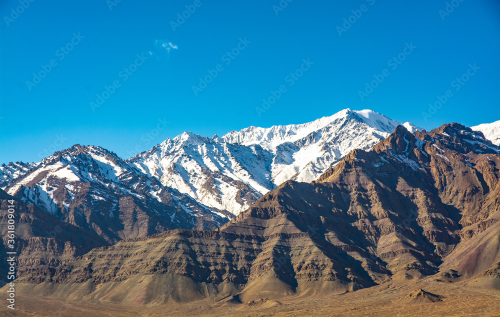 Snow covered the mountains.