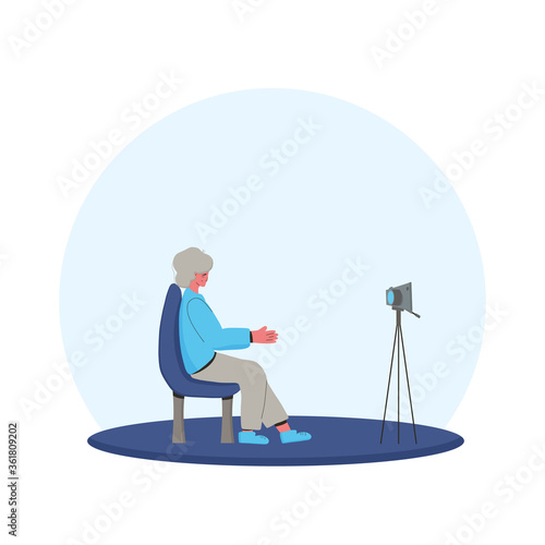 Senior blogger recording a new content. Mature woman in front of the camera.