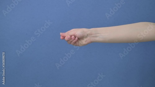 A hand holds out on the right side and picks up a business card.