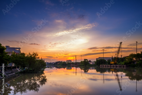 Hai Phong, Vietnam Sep 2015 sunset at Tam Bac river bank with mirror water surface 