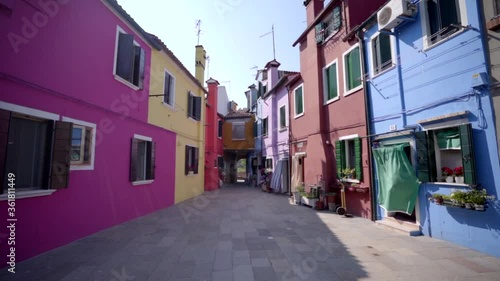 Wallpaper Mural Murano, Italy. Typical street surrounded by colorful buildings in a summer day whit a beautiful blue sky. Torontodigital.ca