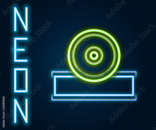 Glowing neon line Otolaryngological head reflector icon isolated on black background. Equipment for inspection the patient's ear, throat and nose. Colorful outline concept. Vector Illustration.