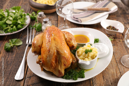 chiken, poultry with mashed potato and sauce