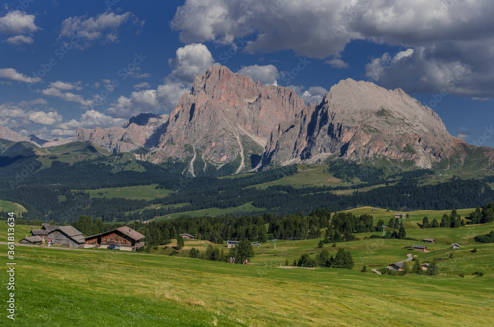 South-east view of Sassolungo  & Sassopiatto mountains, located between Gardena & Fassa valleys, seen from Alpe di Siusi/Seiser Alm, Dolomites, Trentino, Alto Adige, South Tirol, Italy. 