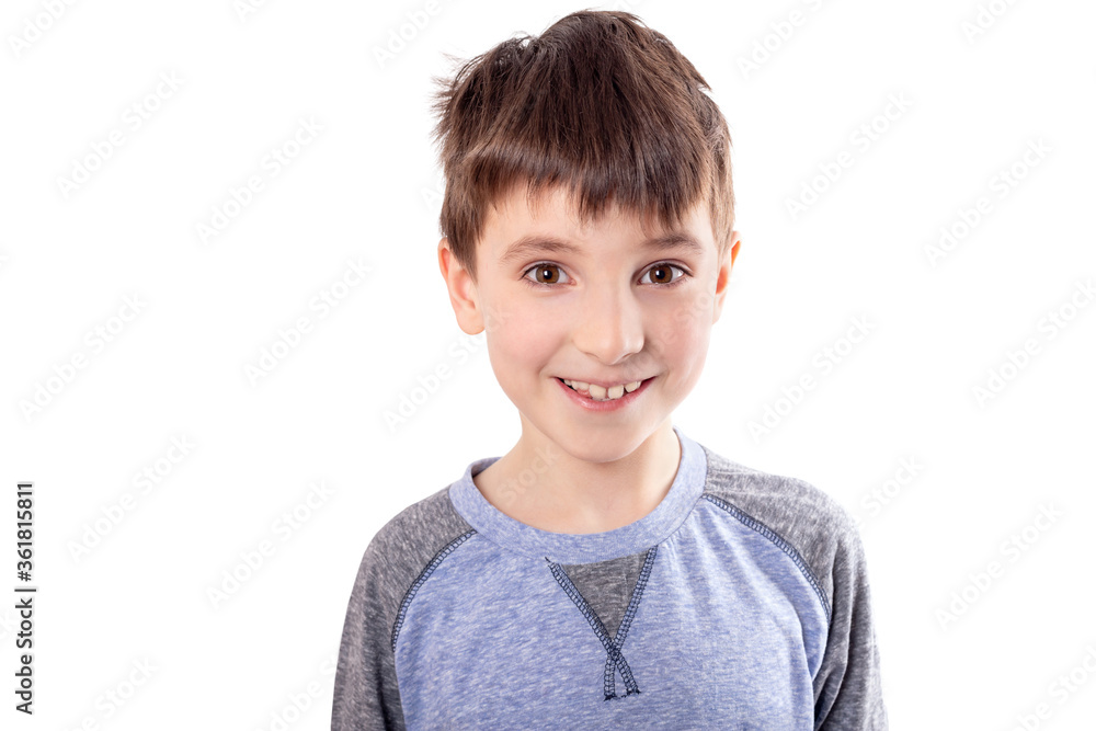 Portrait of a cheerful adorable young boy looking at camera. Portrait of a cheerful adorable young boy looking at camera.