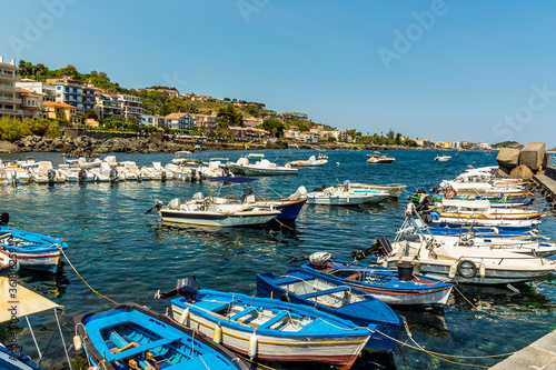 The harbour and promenade of Acicastello, Sicily in summer © Nicola