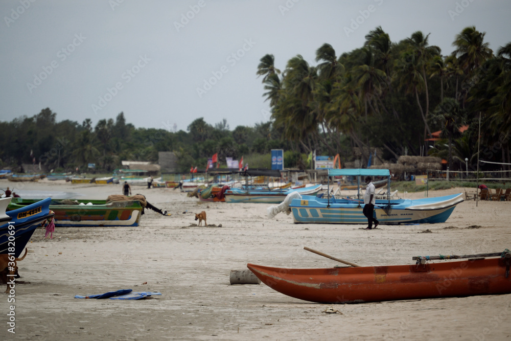 Fototapeta premium boats on a tropical beach