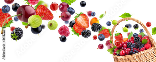 Fresh berries in basket isolated on white background