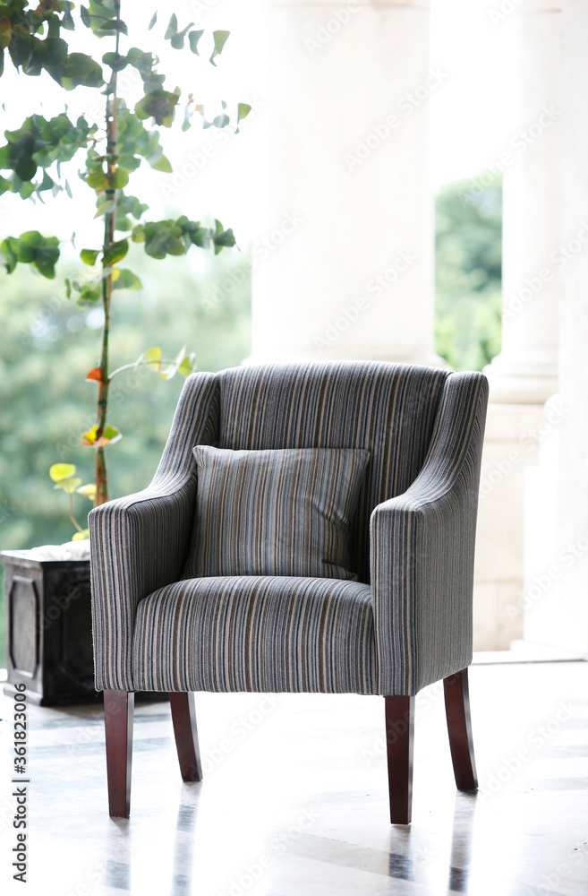 Obraz premium Cozy arm chair in living room