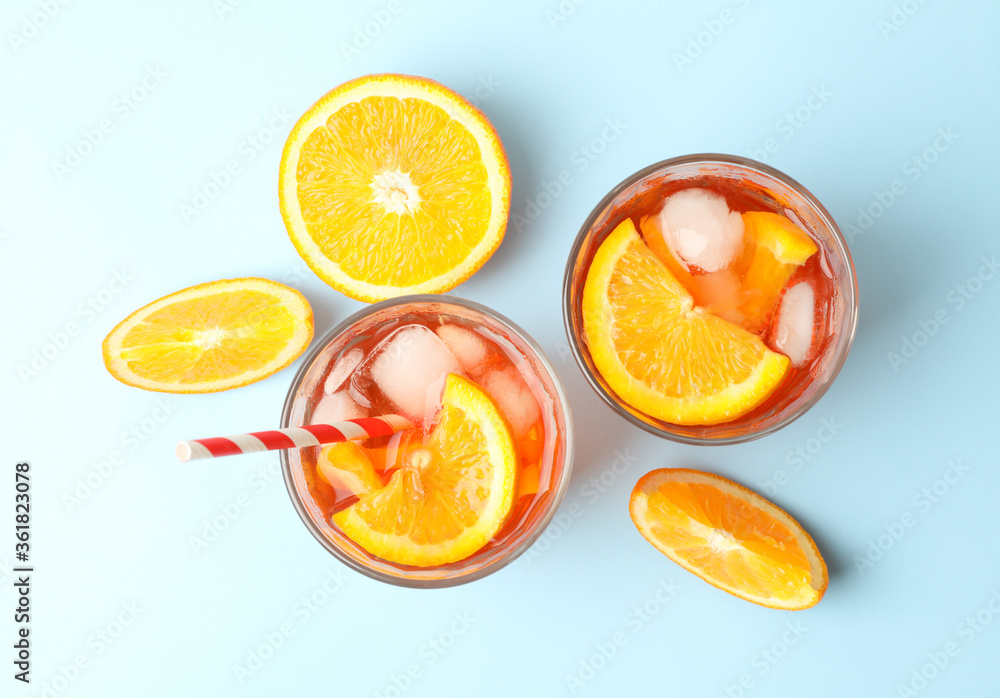 Aperol spritz cocktail on blue background. Summer cocktail Aperol spritz cocktail on blue background. Summer cocktail