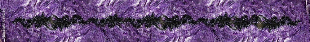 Charoite rock. Wide purple abstract background from polished natural Charoite rock. Wide purple abstract background from polished natural