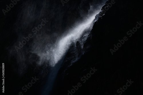 water falling at high speed in a ray of light