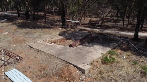 Concrete Ruin On The Ground At Clonlea Park In Gawler, South Australia - orbiting shot photo