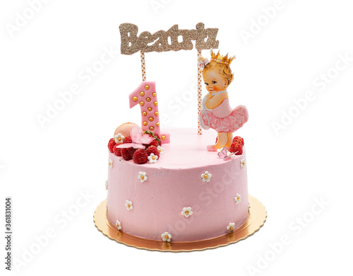 Beautiful children's cake for a girl for a holiday in pink colors. Nome Beatriz. On a white background. photo