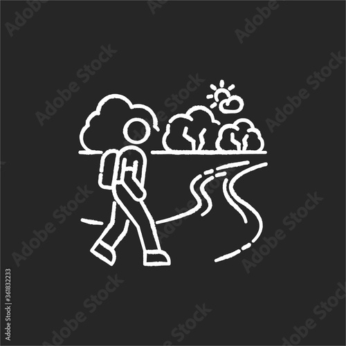 Hiking trail chalk white icon on black background. Active outdoor recreation, trekking tour. Healthy lifestyle activity, fresh air walks. Tourist in forest isolated vector chalkboard illustration