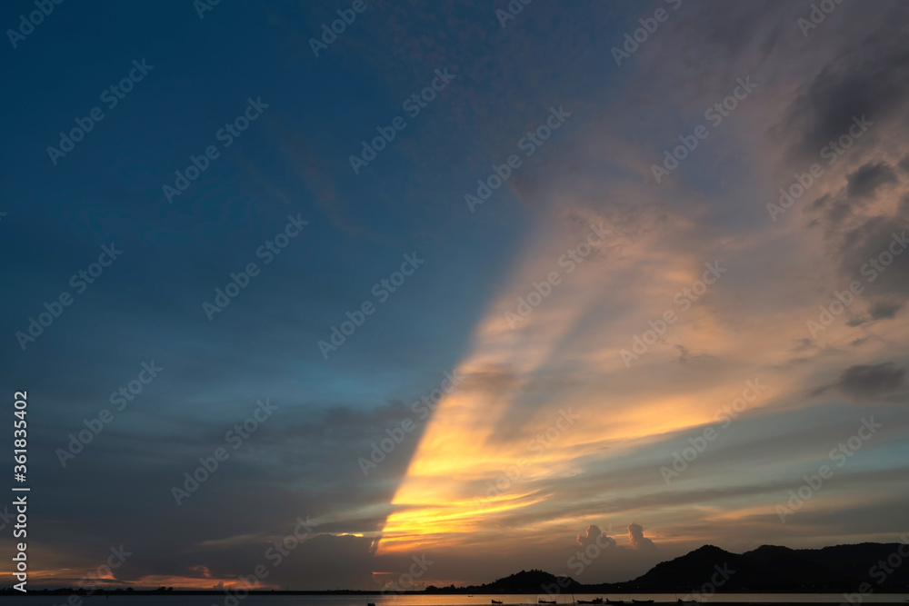 Sunset in the reservoir and mountains