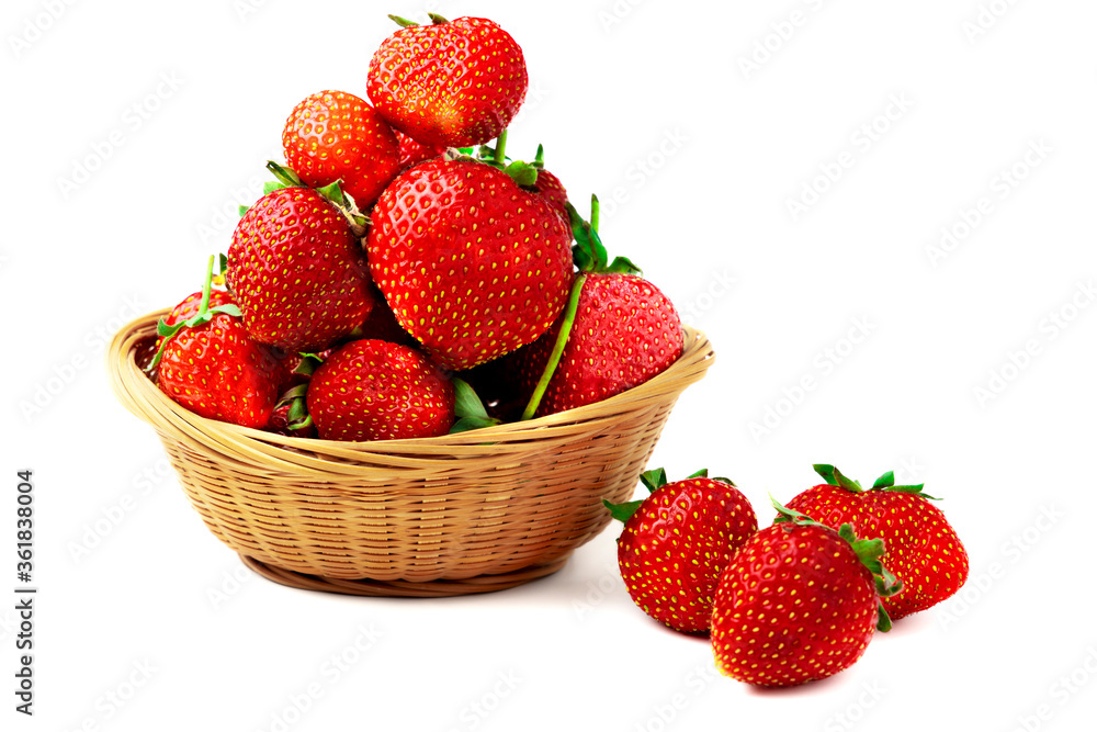 Strawberry. Close-up of sweet ripe strawberries in a basket isolated on a white background. Strawberry. Close-up of sweet ripe strawberries in a basket isolated on a white background.