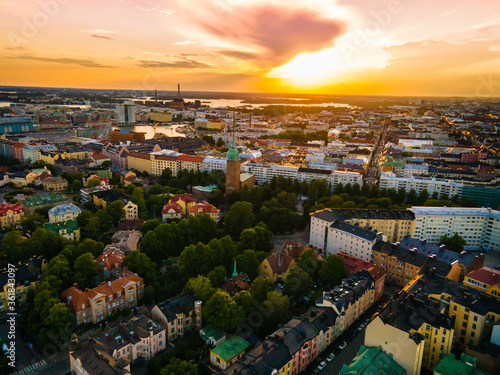 Aerial sunset view of beautiful city Helsinki . Colorful sky and colorful buildings. Helsinki  Finland.