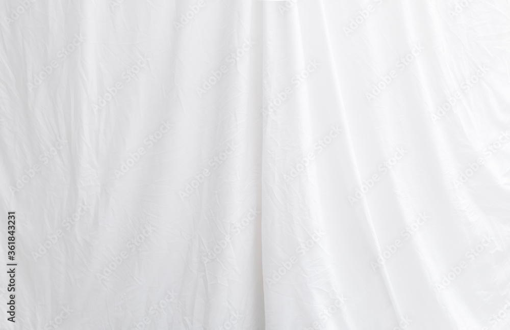 white textured fabric has wrinkles on surface white textured fabric has wrinkles on surface
