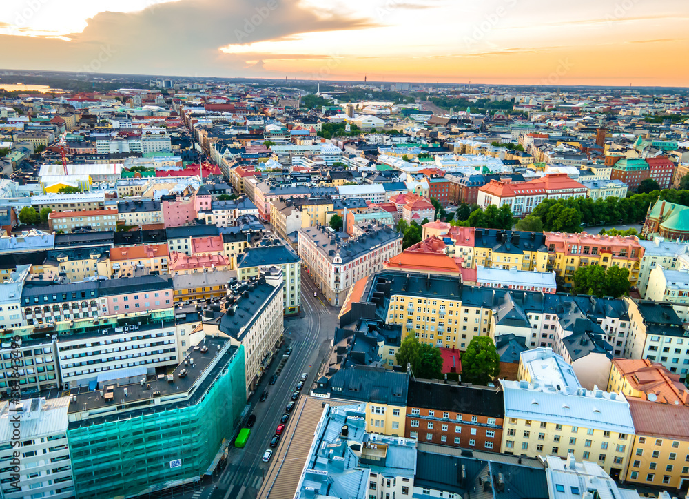 Fototapeta premium Aerial sunset view Helsinki . Colorful sky and colorful buildings. Helsinki, Finland.