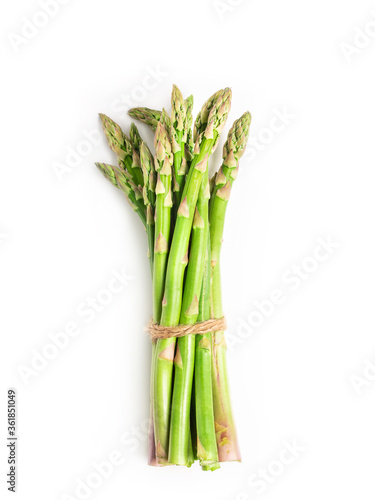 A bunch of asparagus on a white isolated background. Flat lay. The concept of proper nutrition.