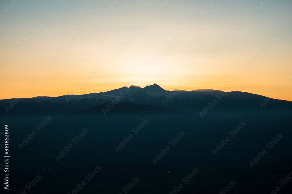 view from the top of Mount Hatis to sunset