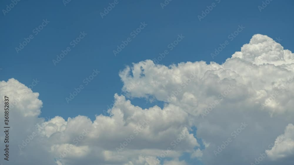 Cumulus clouds form abstract shapes in motion in this cloudscape time lapse Cumulus clouds form abstract shapes in motion in this cloudscape time lapse