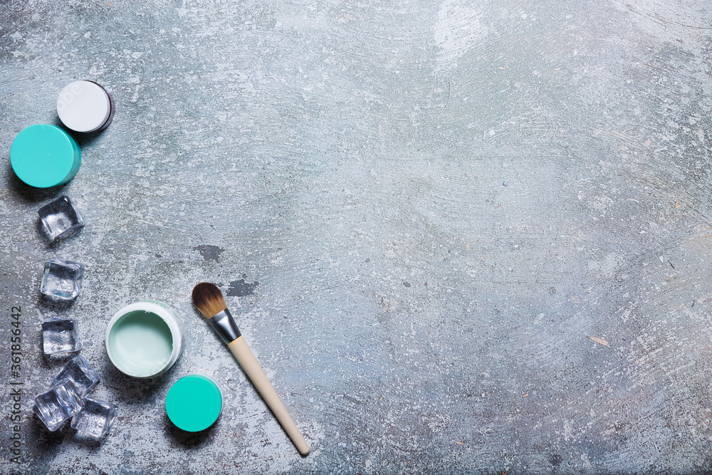 Cosmetics on a concrete background Cosmetics on a concrete background