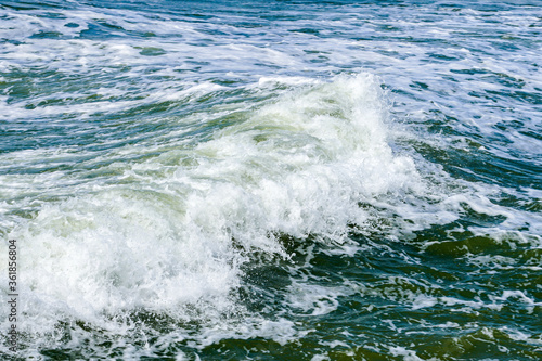 a big wave on the Baltic sea coast during a storm