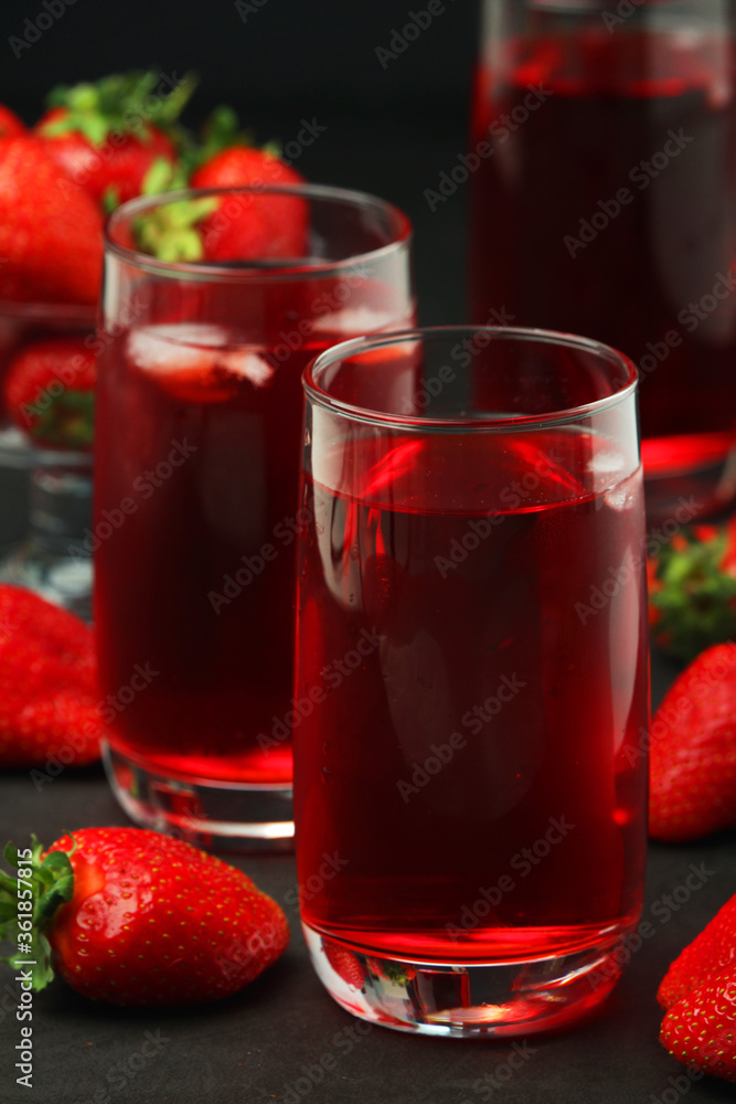 Glasses with strawberry drink with ice Glasses with strawberry drink with ice